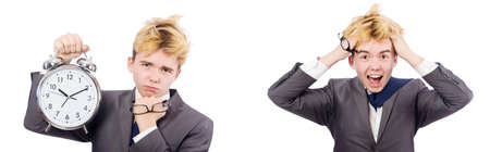Young boy with alarm-clock in time management conceptの写真素材