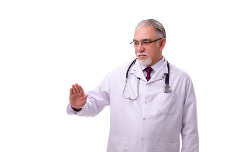 Old male doctor isolated on whiteの写真素材