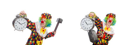 Clown with clock and hammer isolated on whiteの写真素材