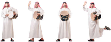 Arab man with drum isolated on whiteの写真素材