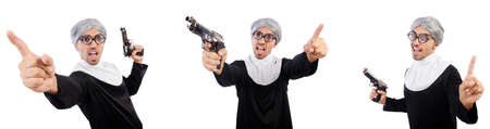 Man in nun dress with handgunの写真素材