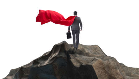 Superhero businessman on top of mountainの写真素材