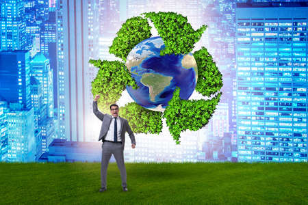 Businessman in recycling ecological concept