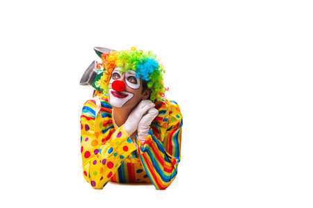 Male clown isolated on whiteの写真素材