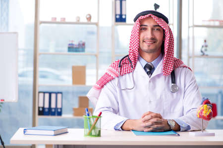 Arab doctor cardiologist working in the clinicの写真素材
