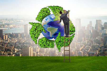 Businessman in recycling ecological conceptの写真素材