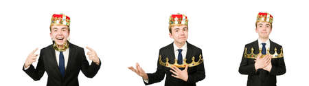 Businessman with crown isolated on whiteの写真素材