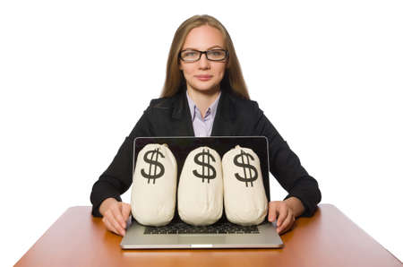Female employee with money sacks on her tableの写真素材