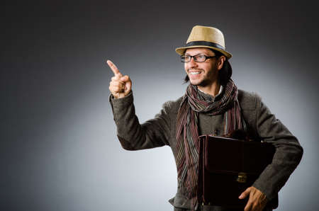 Man wearing vintage hat in funny conceptの写真素材