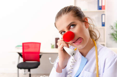 Funny female doctor working in the clinicの写真素材