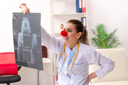 Funny female doctor working in the clinicの写真素材