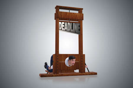 Businessman in deadline concept with guillotineの写真素材