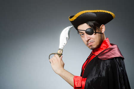 Man pirate against dark backgroundの写真素材