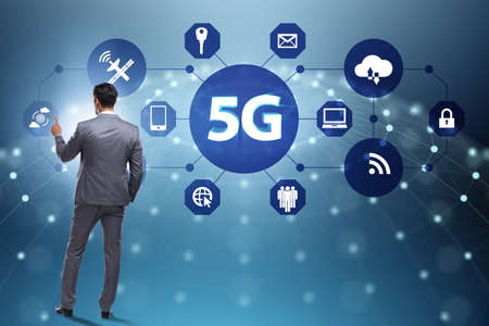 5g internet concept with businessman pressing buttonsの写真素材