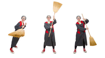 Woman with sweeping brush isolated on whiteの写真素材