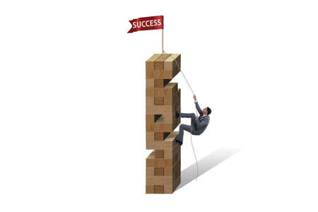 Businessman climbing to the top successの写真素材