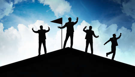 Businessmen in achievement and teamwork concept