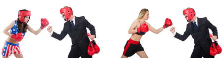 Young employee with boxing gloves isolated on whiteの写真素材