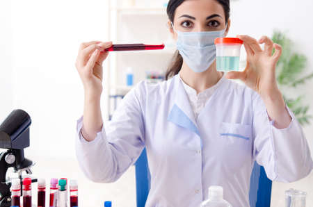 Young female chemist working in the labの写真素材