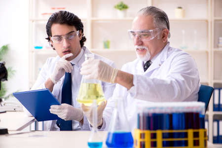 Two chemists working in the labの写真素材