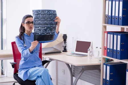Young female doctor radiologist working in the clinic