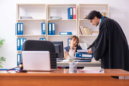 Two lawyers working in the officeの写真素材