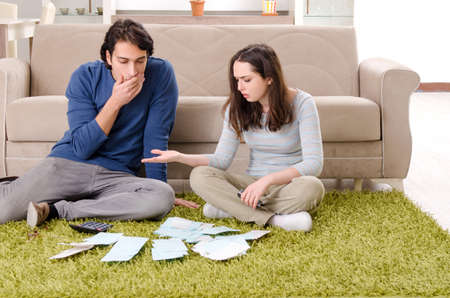 Young couple in budget planning concept