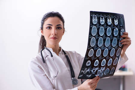 Young female doctor radiologist working in the clinicの写真素材
