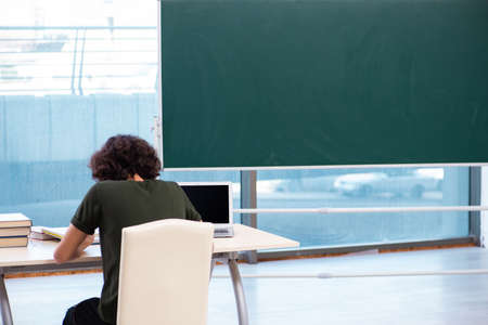 Male student in the classroomの写真素材