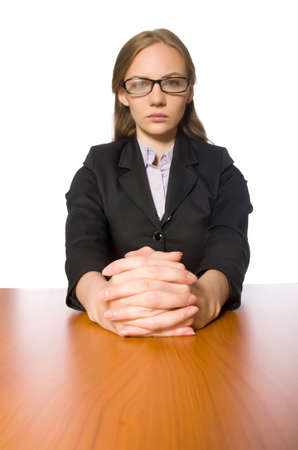 Female employee sitting at long table isolated on whiteの写真素材