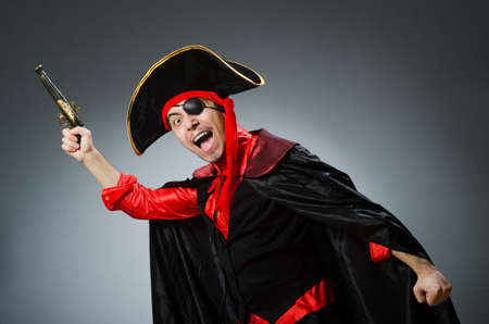 Man pirate against dark backgroundの写真素材