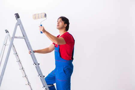 Young handsome contractor working indoorsの写真素材