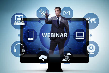 Businessman in online webinar conceptの写真素材