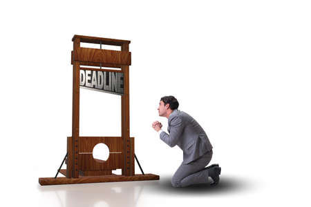 Businessman in deadline concept with guillotine