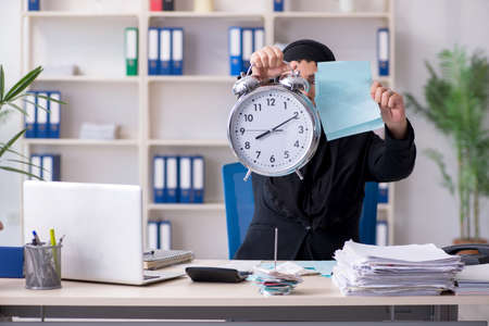 Female employee bookkeeper in hijab working in the officeの写真素材