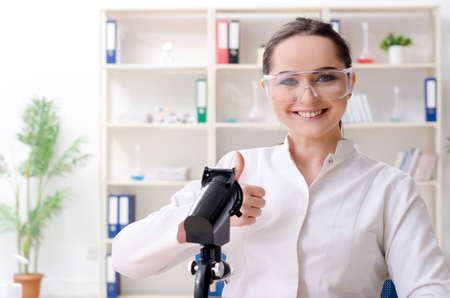 Young female chemist working in the lab