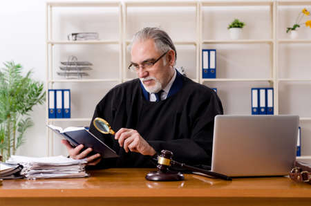 Aged lawyer working in the courthouseの写真素材