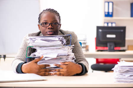 Black female employee unhappy with excessive work
