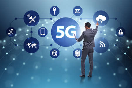 5g internet concept with businessman pressing buttonsの写真素材