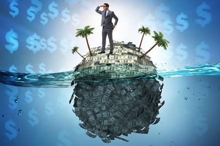 Offshore accounts concept with businessmanの写真素材