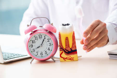 Male doctor stomatologist working in the clinic