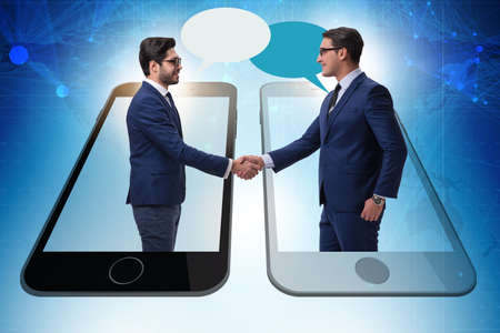 Concept of communication with businessmen handshakingの写真素材