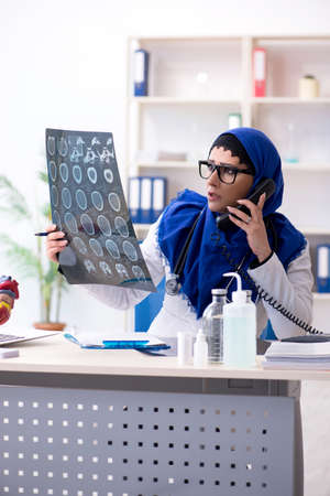 Female doctor in hijab working in the hospitalの写真素材