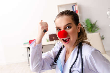 Funny female doctor working in the clinicの写真素材