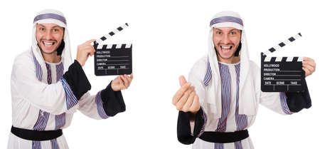 Arab man with clapper-board isolated on whiteの写真素材