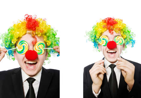 Clown with lollipop isolated on whiteの写真素材