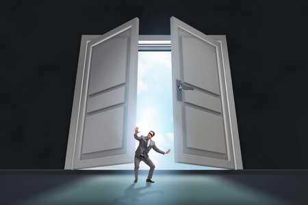 Blindfold businessman in uncertainty conceptの写真素材