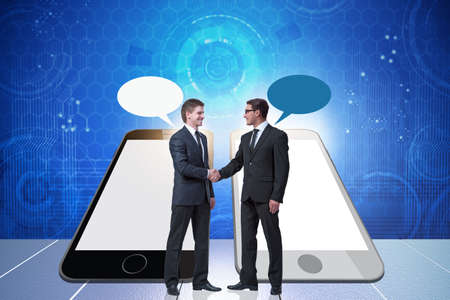 Concept of communication with businessmen handshakingの写真素材