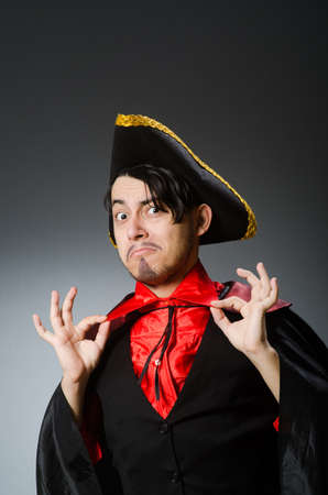 Man pirate against dark backgroundの写真素材