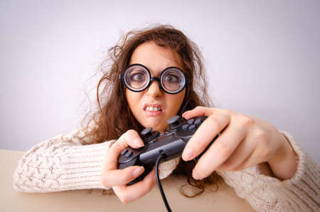 Funny nerd girl working on computer